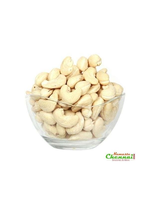 Cashew nuts, pistachios and almond, beautiful wallpaper with on a black  background Stock Photo - Alamy